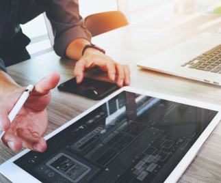 website-designer-working-digital-tablet-and-computer-laptop-and-digital-design-diagram-1